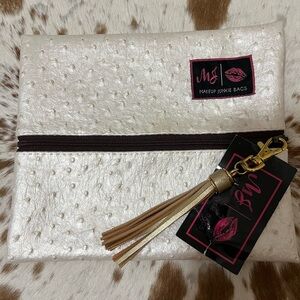 NWT Makeup Junkie size small White Clutch